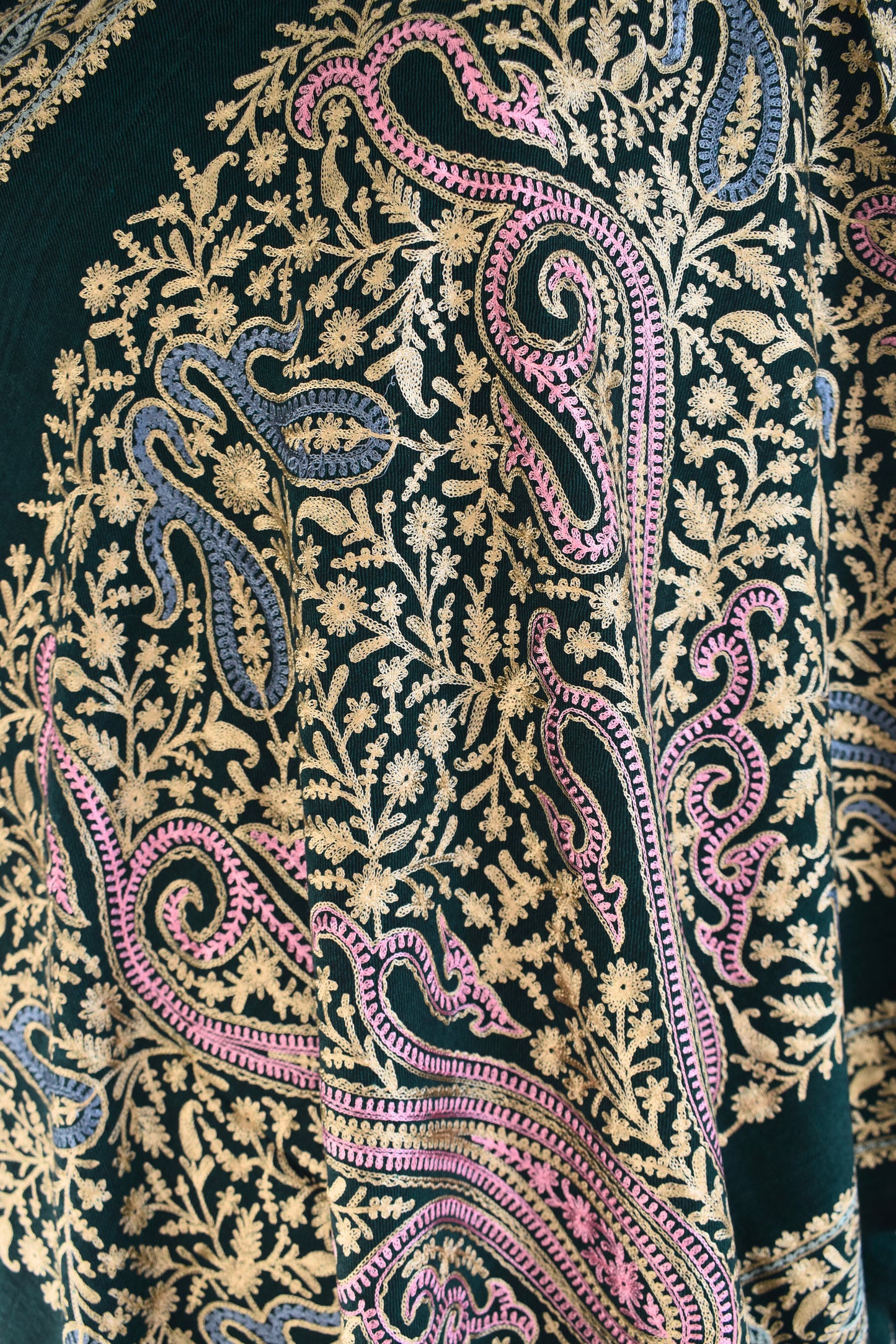 Close-up of intricate paisley pattern embroidery on paisley couture stole.