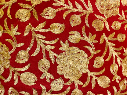 Gold floral embroidery on a red stole